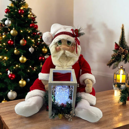 Merry Clauson (with a gift) – A Handcrafted Holiday Treasure