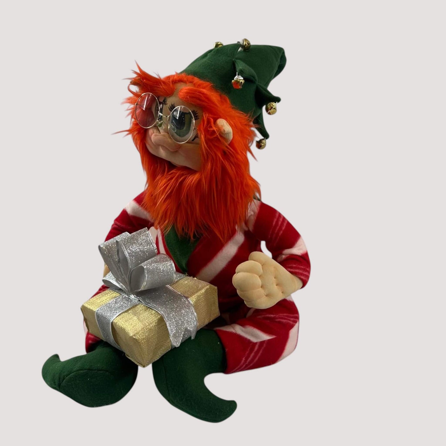 Handmade Christmas elf traditional decor with festive red and green colors
