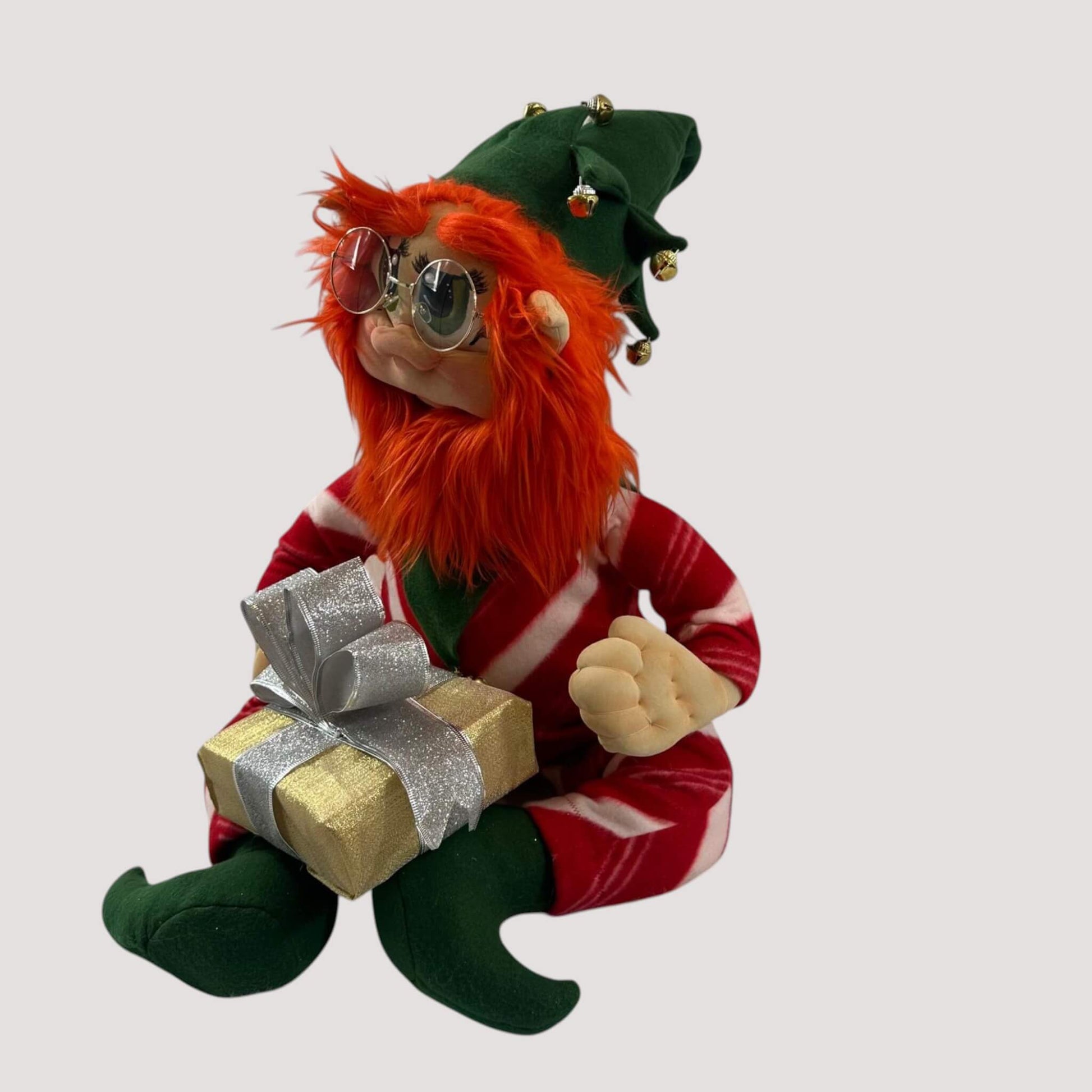 Handmade Christmas elf traditional decor with festive red and green colors
