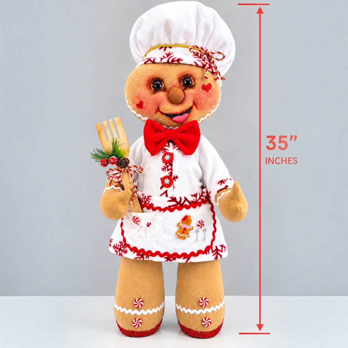 35-inch tall handmade removable Christmas Gingerbread Baker decoration showing full height and festive chef outfit.