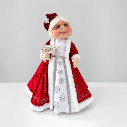 Full front view of 36-inch handmade Mrs. Claus in a red and white dress with silver snowflake details.