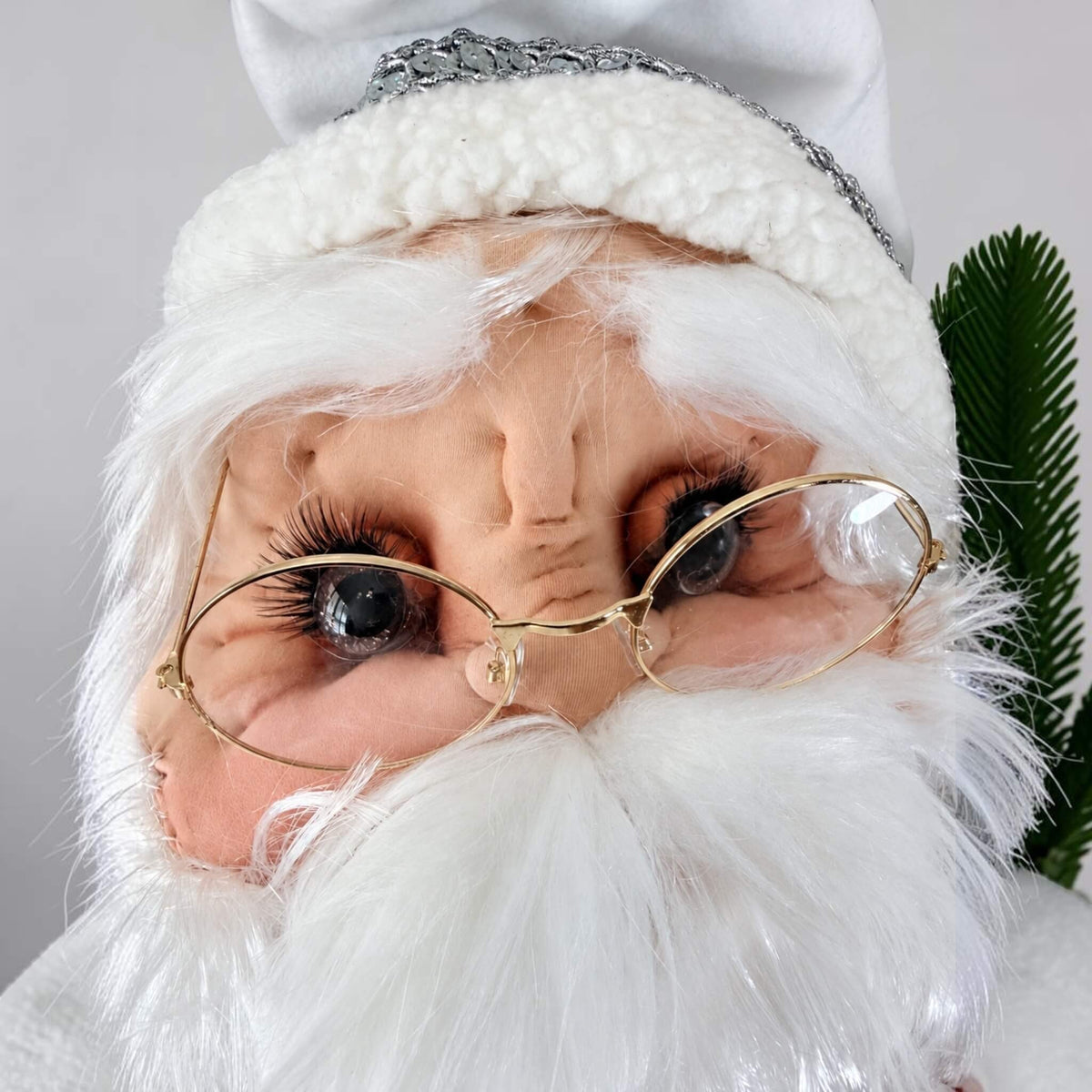 Full front view of 36-inch handmade Mrs. Claus in a red and white dress with silver snowflake details.
