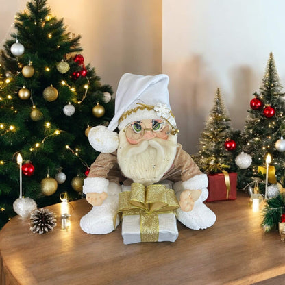 Merry Clauson (with a gift) – A Handcrafted Holiday Treasure