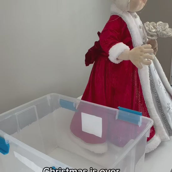 Video demonstrating a handmade Mrs. Claus Christmas decoration with removable head, torso, and legs. Shows the disassembly process, detailed red and white holiday outfit, and how the separate pieces fit into a storage container for convenient seasonal storage.
