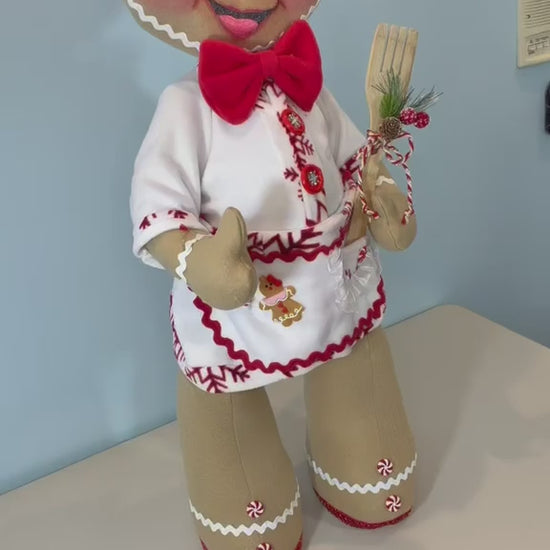 Video demonstrating a handmade 35-inch Gingerbread Baker Christmas decoration by DW Craftworks. Shows the removable head, torso, and legs, detachable chef outfit, and detailed handcrafted accessories. Highlights the easy disassembly and space-saving storage design. Handmade in the USA.
