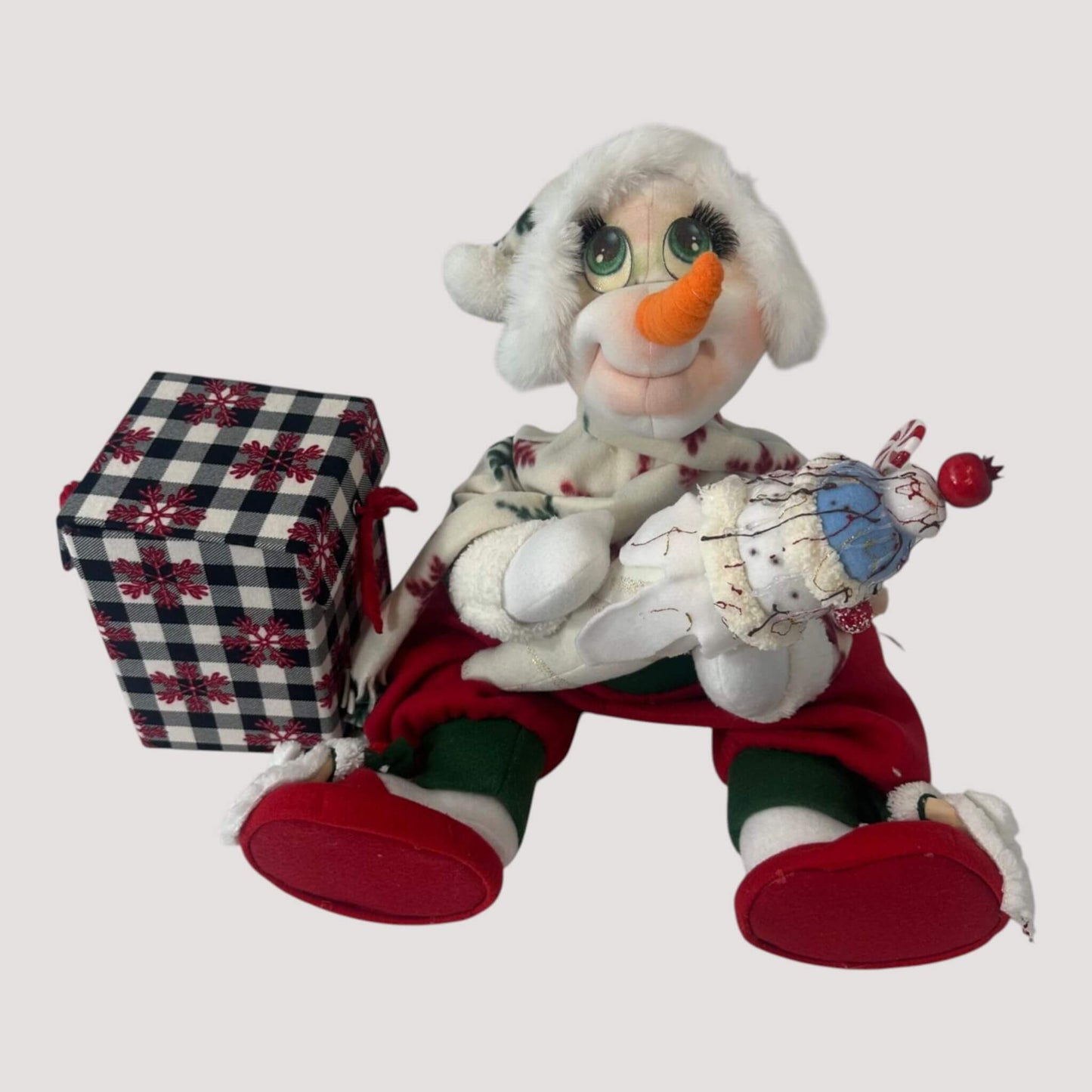 Snowman holiday decoration close-up showing premium materials and details
